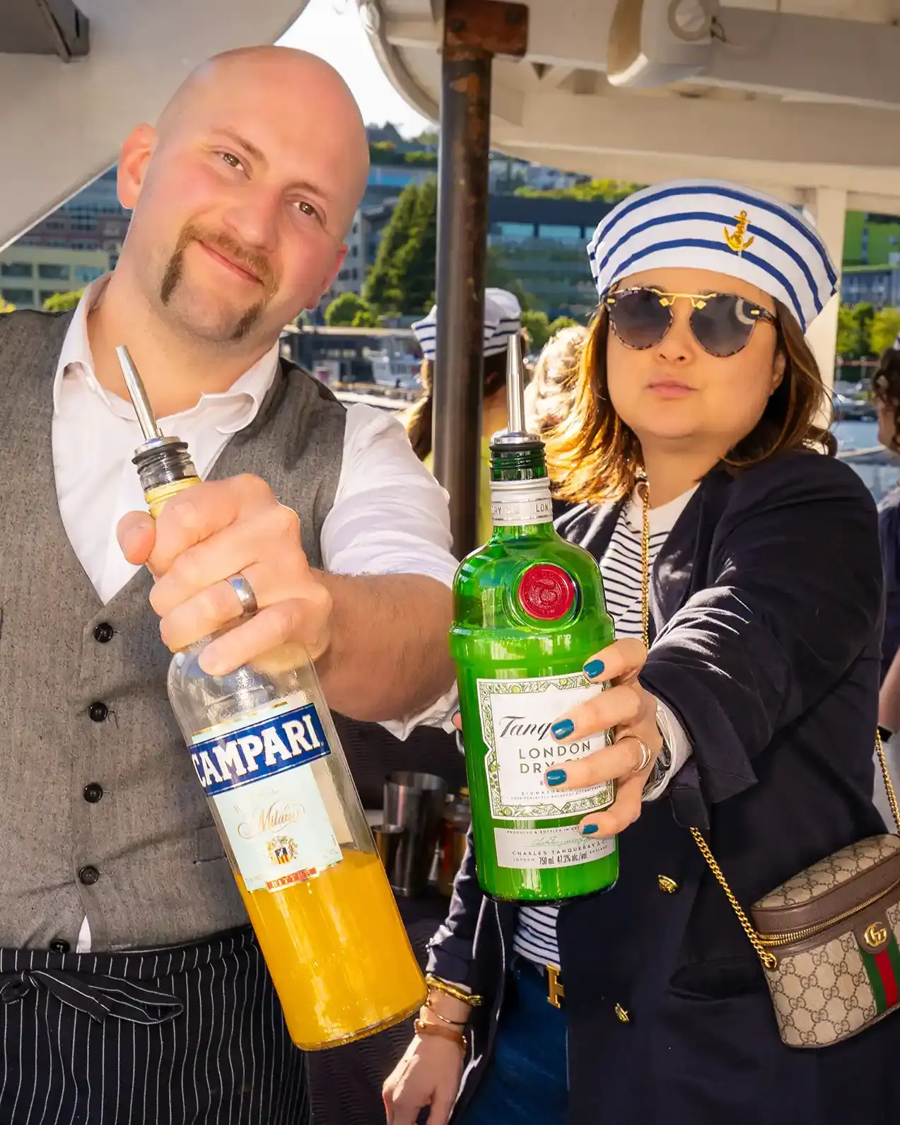 Two Tipsy Tiger bartenders having fun behind the bar
